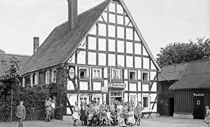 Prints of Mit den Naturfreunden Köln vor einem Gasthaus auf einer Wanderung im Bergischen Land, Deutschland 1920er Jahre. With the Naturfreunde Cöln group in front of an inn on a hike, Germany 1920s Jakob Volk Prints: Bergisches Land