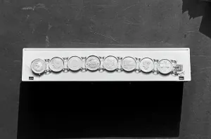 Bracelet avec pièces de monnaie Volkswagen, Allemagne 1970.