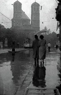 Prints of Gereonstrasse und Kirche St. Gereon in der Innenstadt von Köln im Regen, Deutschland 1930er Jahre. Gereonstrasse street and St. Gereon's church at Cologne city centre in the rain, Germany 1930s Jakob Volk Prints: Köln